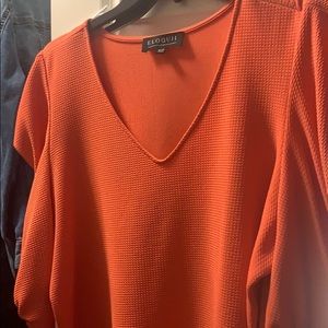 Orange puffy sleeve shirt